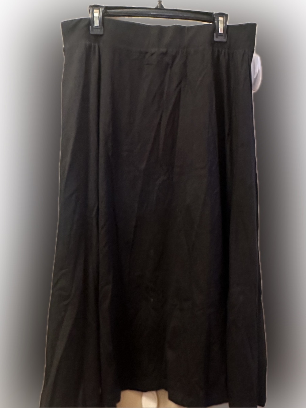 Women’s Black Midi Skirt – Sleek A-Line Fit & Flate with pockets.